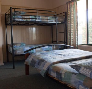 Bunk Beds and Double Bed with Geometric patterned Sheeting